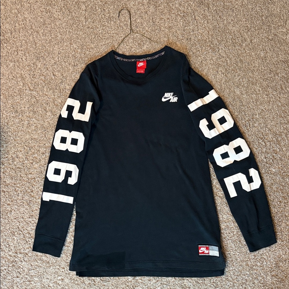 Vintage Nike Black Long Sleeve Tee with White '1982' Sleeve Graphics